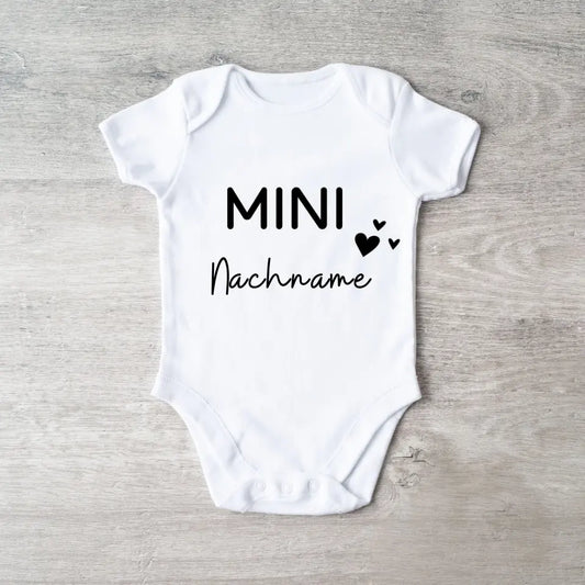 Mini achternaam - gepersonaliseerde baby onesie/romper, 100% biologisch katoenen bodysuit